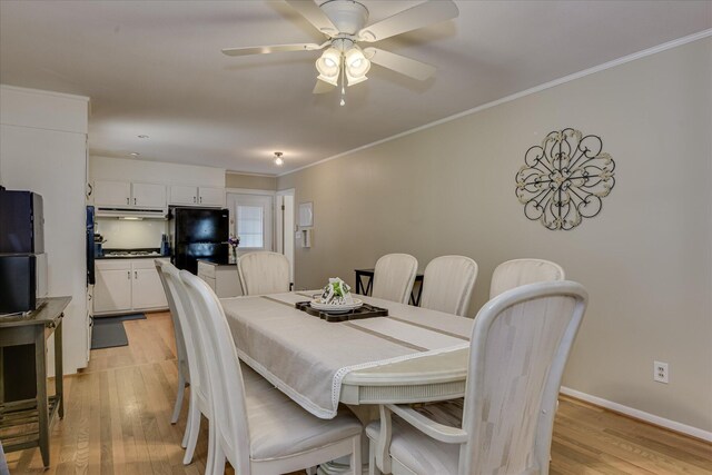 2408 Forest Park Rd, Augusta, GA 30904 - dining area with light wood-style floors, ceiling fan, crown molding, and baseboards