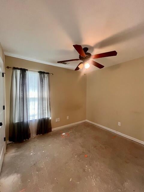 510 Lory Ln, Grovetown, GA 30813 - spare room featuring ceiling fan, unfinished concrete floors, and baseboards