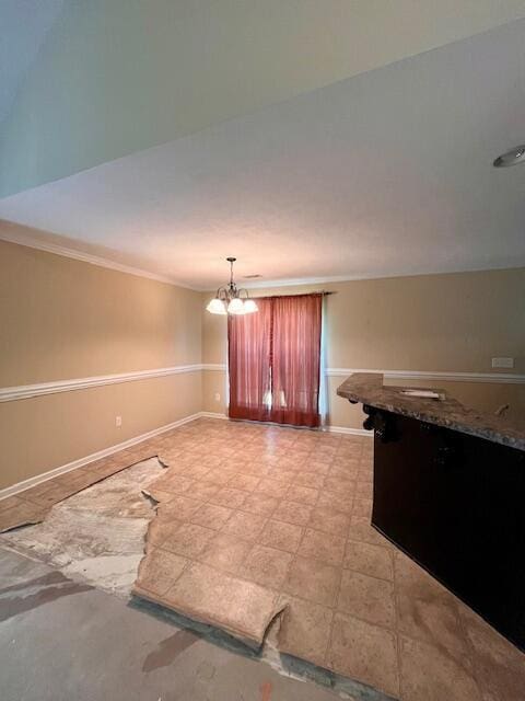 510 Lory Ln, Grovetown, GA 30813 - empty room with ornamental molding, a chandelier, and baseboards