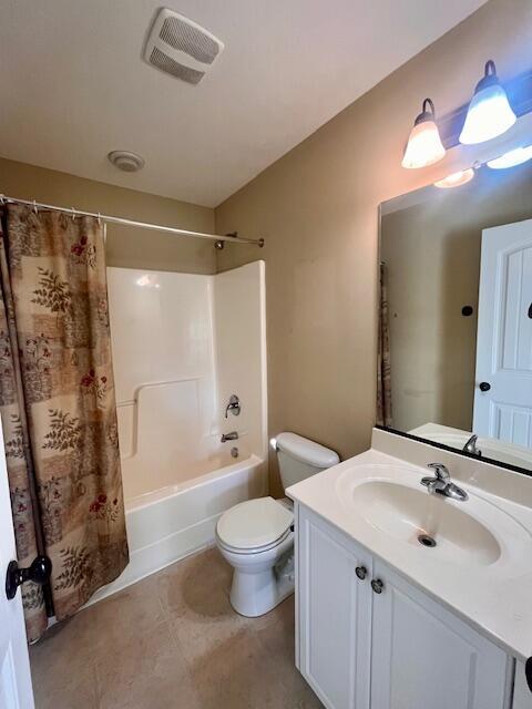 510 Lory Ln, Grovetown, GA 30813 - bathroom featuring vanity, shower / tub combo, toilet, and tile patterned flooring