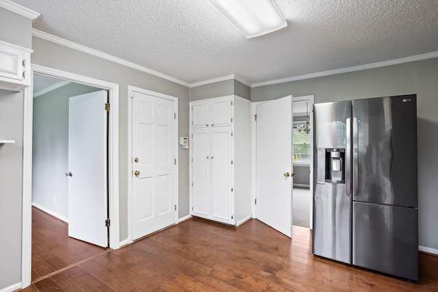 2901 Sussex Rd, Augusta, GA 30904 - kitchen featuring stainless steel refrigerator with ice dispenser, dark wood-style flooring, white cabinets, a textured ceiling, and crown molding