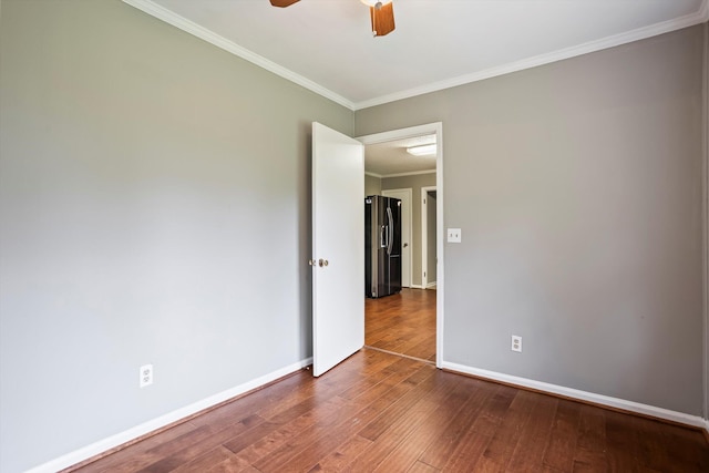 2901 Sussex Rd, Augusta, GA 30904 - unfurnished room featuring a ceiling fan, wood-type flooring, ornamental molding, and baseboards
