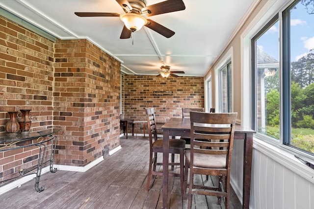 2901 Sussex Rd, Augusta, GA 30904 - sunroom / solarium with brick wall and hardwood / wood-style floors
