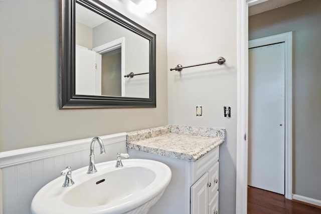 2901 Sussex Rd, Augusta, GA 30904 - bathroom with a sink, wood finished floors, and wainscoting