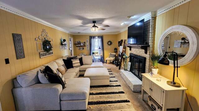 doorway with ornamental molding, a fireplace, and carpet