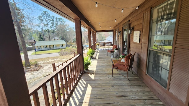 deck featuring covered porch