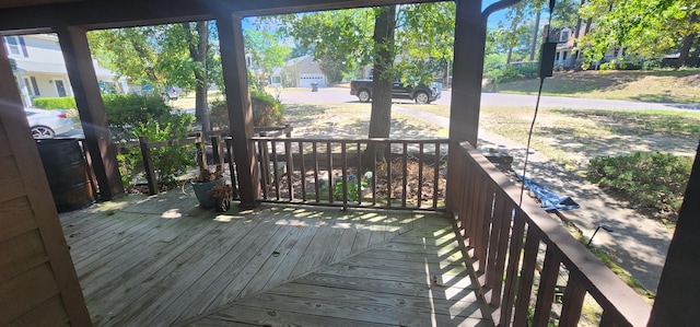 wooden terrace featuring a porch