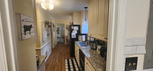 hallway with dark wood-type flooring and a sink