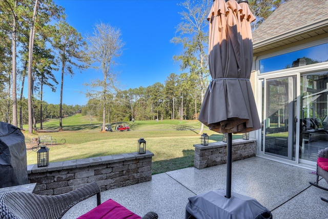 view of patio featuring golf course view