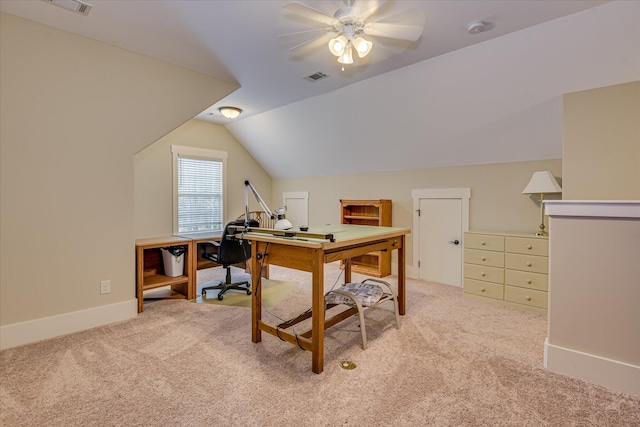 office space with ceiling fan, vaulted ceiling, visible vents, and carpet flooring