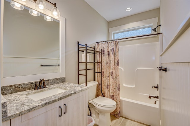 bathroom featuring shower / tub combo with curtain, wood finished floors, toilet, and vanity
