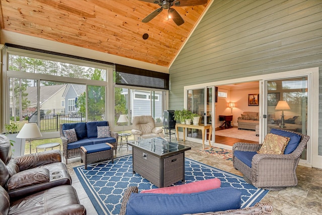 sunroom / solarium featuring an outdoor hangout area and ceiling fan