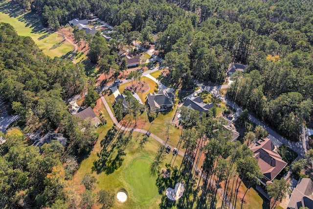 bird's eye view featuring a view of trees, a residential view, and view of golf course