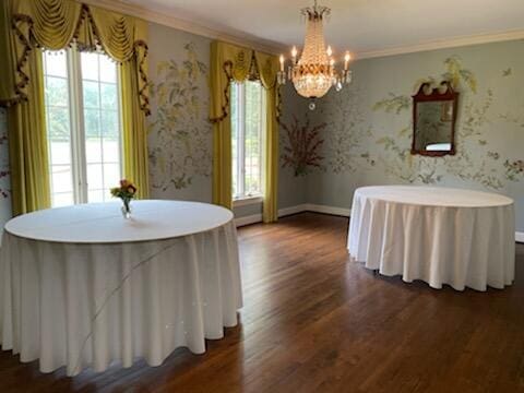 506 Regent Pl, Augusta, GA 30909 - dining area with a chandelier, wood finished floors, and crown molding