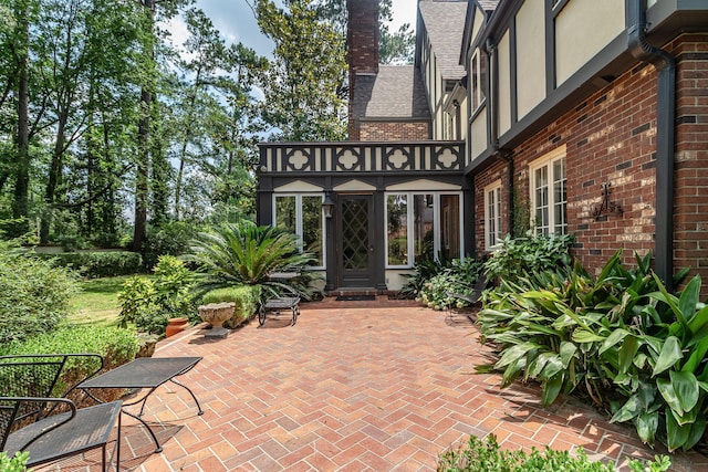 506 Regent Pl, Augusta, GA 30909 - entrance to property with brick siding, a patio area, and stucco siding