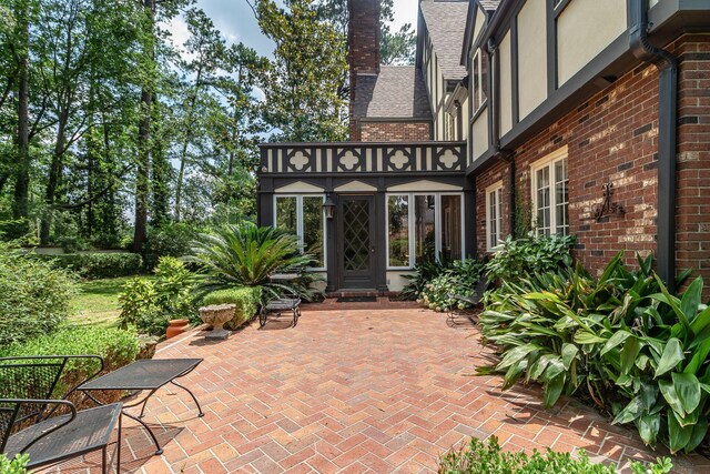 506 Regent Pl, Augusta, GA 30909 - entrance to property with brick siding, a patio area, and stucco siding