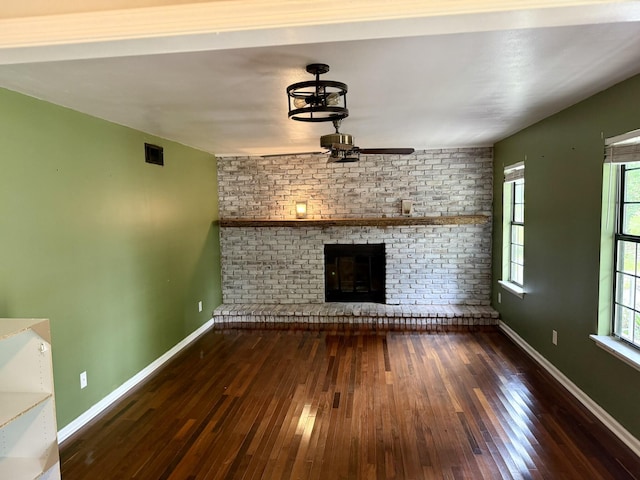 3777 Pine Ridge Run, Martinez, GA 30907 - unfurnished living room with a ceiling fan, hardwood / wood-style flooring, plenty of natural light, and a brick fireplace