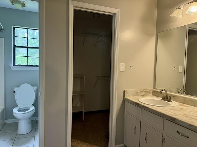 3777 Pine Ridge Run, Martinez, GA 30907 - full bath featuring vanity, a spacious closet, tile patterned flooring, and a tub to relax in