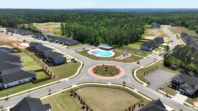 aerial view featuring a wooded view