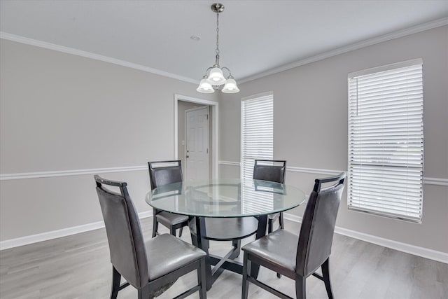 2904 Pleasant Ct, Augusta, GA 30907 - dining space featuring light wood-type flooring, ornamental molding, and a chandelier