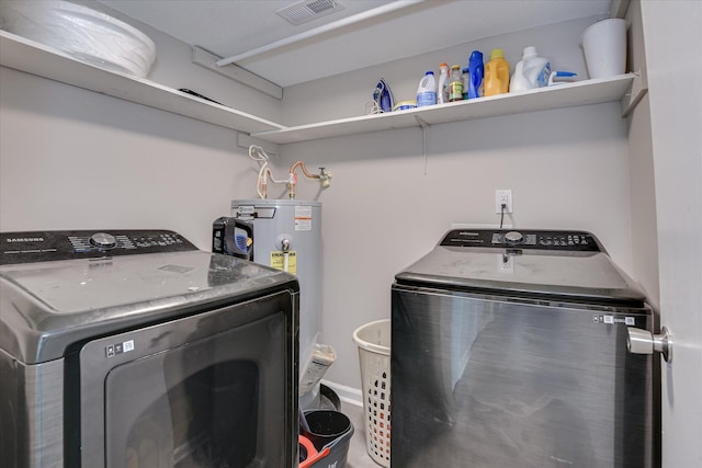 2904 Pleasant Ct, Augusta, GA 30907 - laundry area featuring washer and clothes dryer and water heater