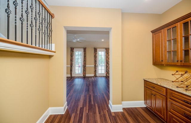 corridor with dark wood-type flooring