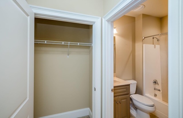 full bathroom with shower / bathing tub combination, vanity, and toilet