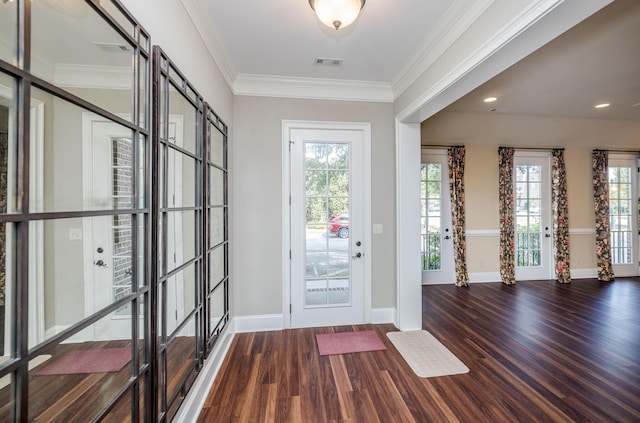 foyer featuring hardwood / wood-style floors and ornamental molding