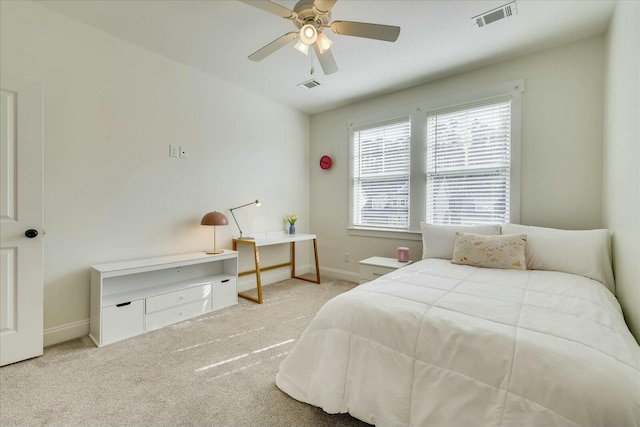 bedroom with carpet, baseboards, visible vents, and a ceiling fan