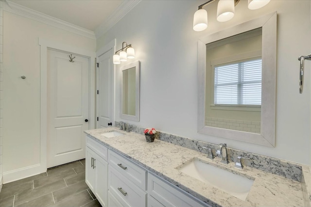 bathroom with crown molding, a sink, and double vanity