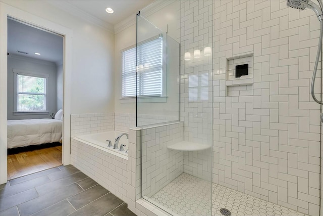 ensuite bathroom featuring a garden tub, connected bathroom, a tile shower, wood tiled floor, and crown molding