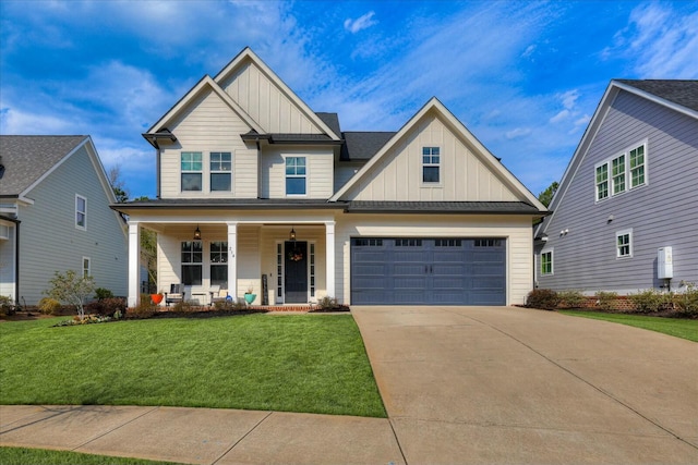 craftsman house with board and batten siding, a front yard, a porch, and driveway