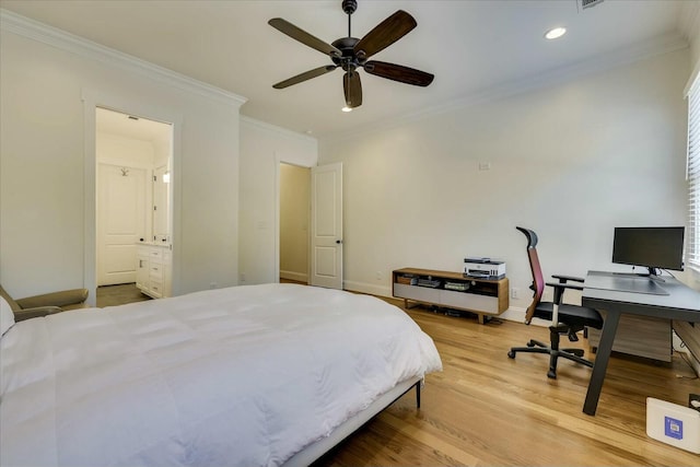 bedroom with baseboards, wood finished floors, ensuite bathroom, crown molding, and recessed lighting