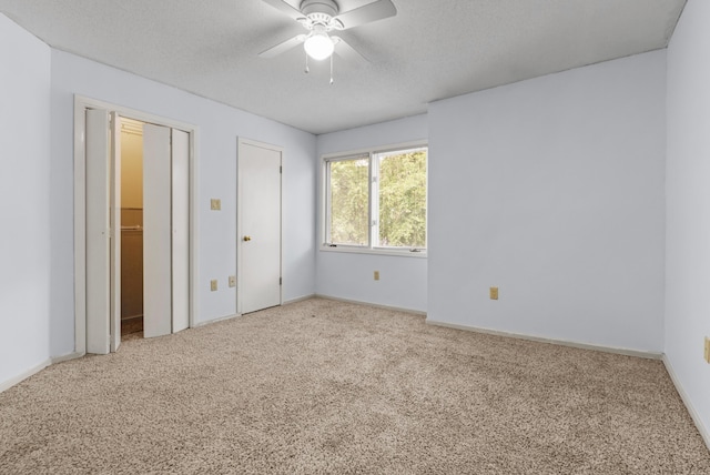 3252 Summerchase Cir, Augusta, GA 30909 - unfurnished bedroom with carpet floors, a textured ceiling, baseboards, and a ceiling fan