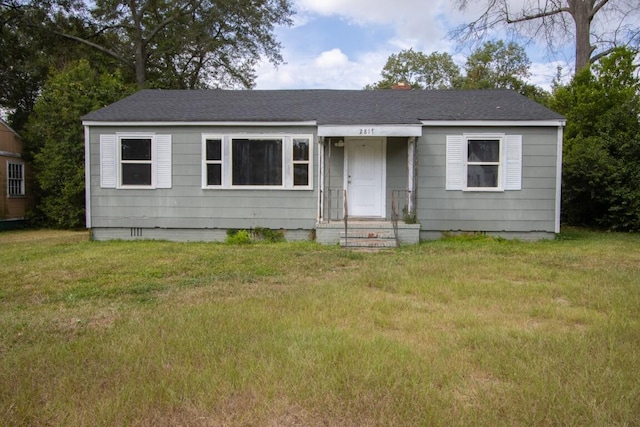 view of front of property with a front lawn