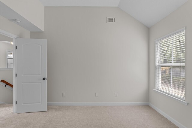 1606 Cedar Hill Dr, Grovetown, GA 30813 - empty room with light colored carpet, plenty of natural light, a smoke detector, and lofted ceiling