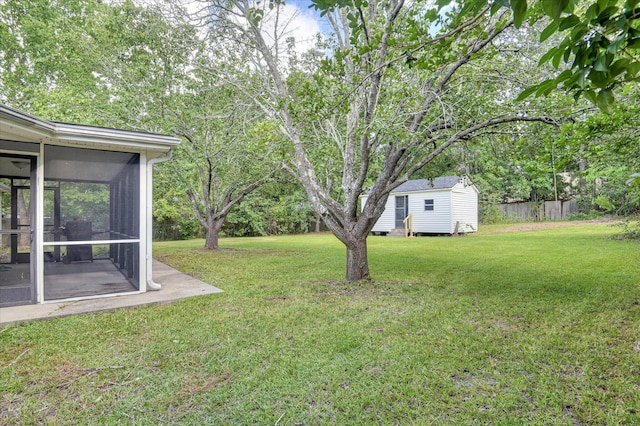 4520 Caliburn Way, Grovetown, GA 30813 - view of yard featuring a sunroom and a shed