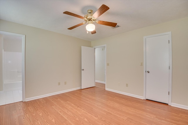 4520 Caliburn Way, Grovetown, GA 30813 - unfurnished bedroom with light wood-type flooring, ensuite bathroom, and a ceiling fan