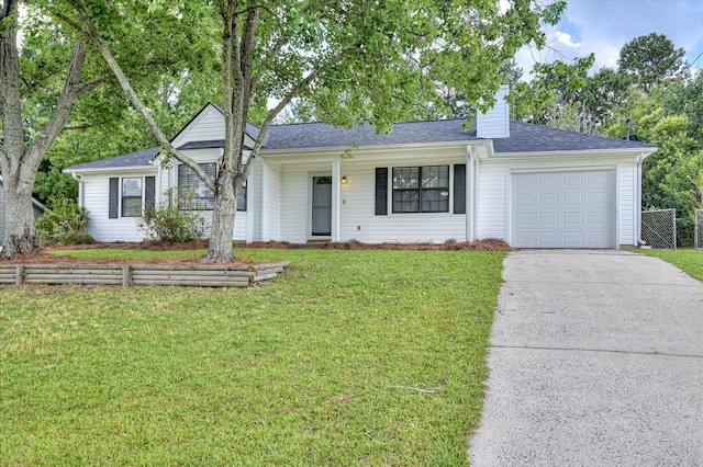 4520 Caliburn Way, Grovetown, GA 30813 - ranch-style home featuring an attached garage, concrete driveway, a chimney, and a shingled roof