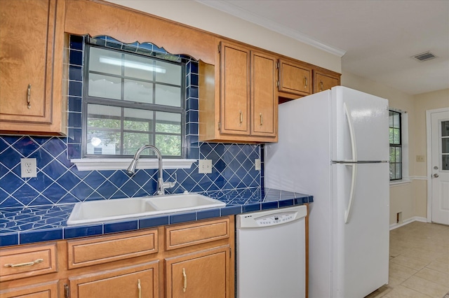 4520 Caliburn Way, Grovetown, GA 30813 - kitchen featuring white appliances, tile countertops, brown cabinetry, and decorative backsplash