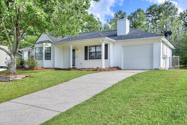 4520 Caliburn Way, Grovetown, GA 30813 - ranch-style house with driveway, an attached garage, a front lawn, and a chimney