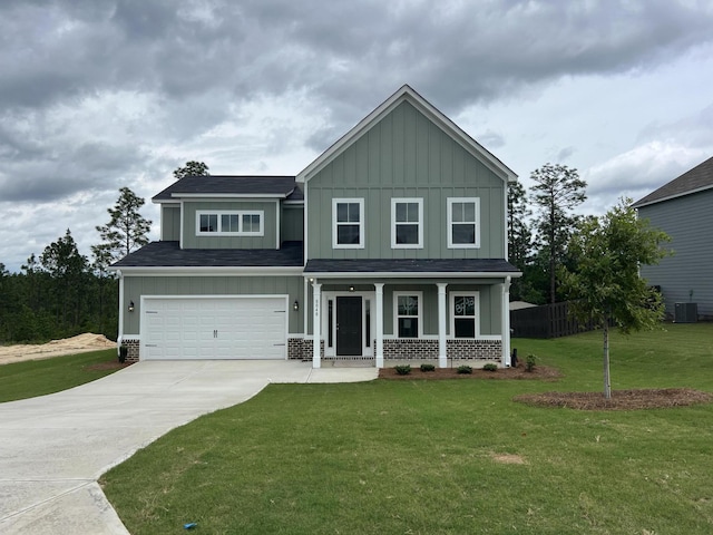 8048 Crossbow Lndg, Graniteville, SC 29829 - craftsman-style home with board and batten siding, covered porch, concrete driveway, a garage, and cooling unit