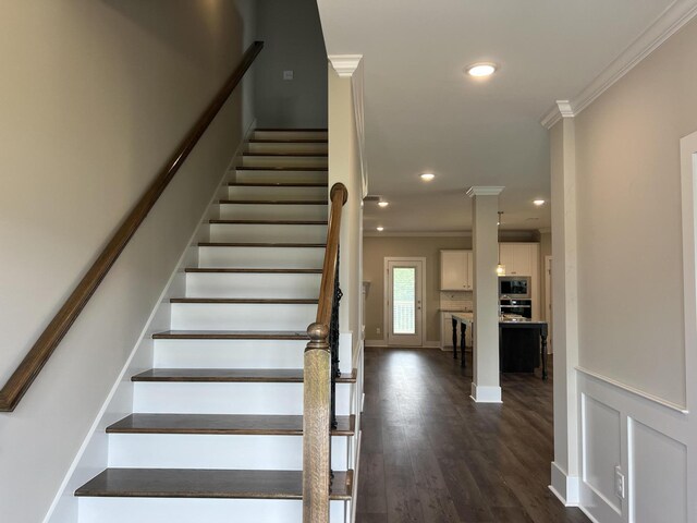 8048 Crossbow Lndg, Graniteville, SC 29829 - staircase featuring ornamental molding, recessed lighting, and wood finished floors
