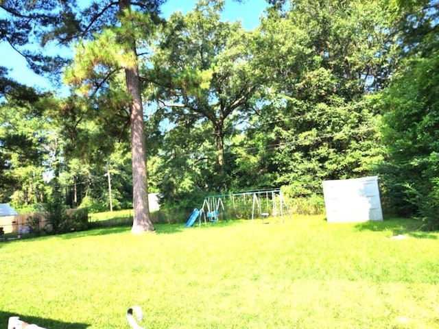 view of yard with a playground