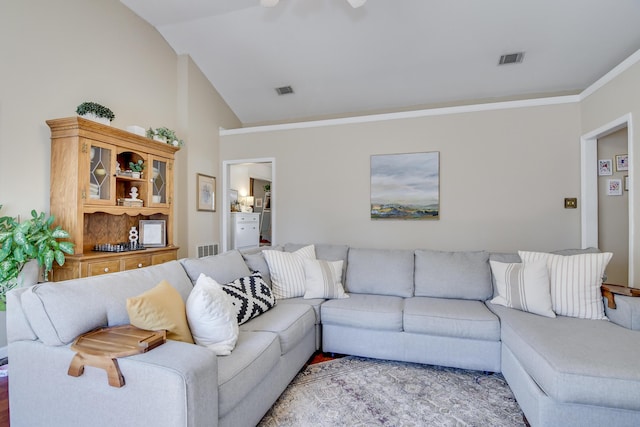 living room with lofted ceiling, visible vents, and ornamental molding