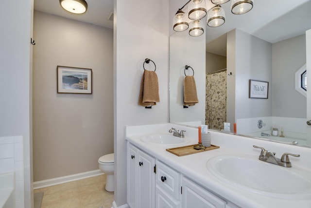 full bath featuring double vanity, baseboards, toilet, and a sink