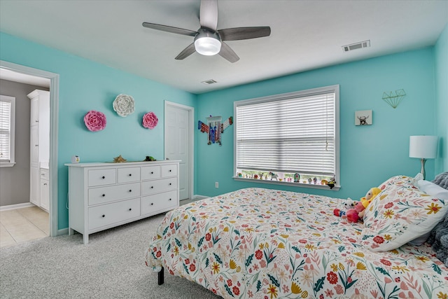 1176 Sumter Landing Cir, Evans, GA 30809 - carpeted bedroom with a ceiling fan and ensuite bath