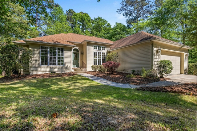 ranch-style house with crawl space, concrete driveway, an attached garage, a front yard, and roof with shingles