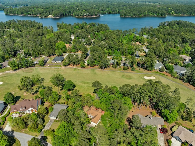 bird's eye view featuring a residential view, golf course view, and a water view