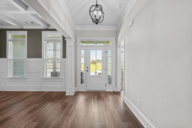 1253 Elbron Dr, Augusta, GA 30909 - foyer featuring dark wood-style floors, a chandelier, a wainscoted wall, beam ceiling, and crown molding